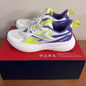 Reebok Verse women's running sneakers white/purple/neon/yellow accents.